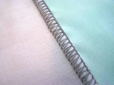 Flatlock seam detail joining two activewear fabric panels