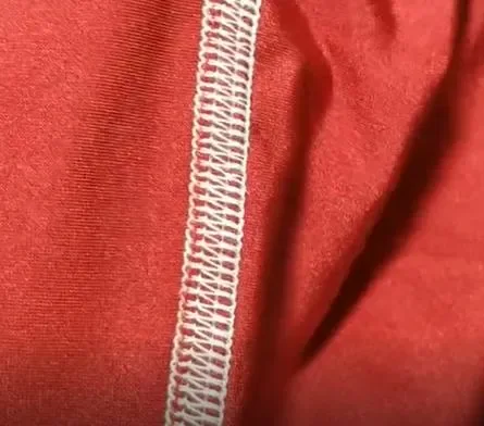 Four-needle six-thread stretch seam on activewear fabric