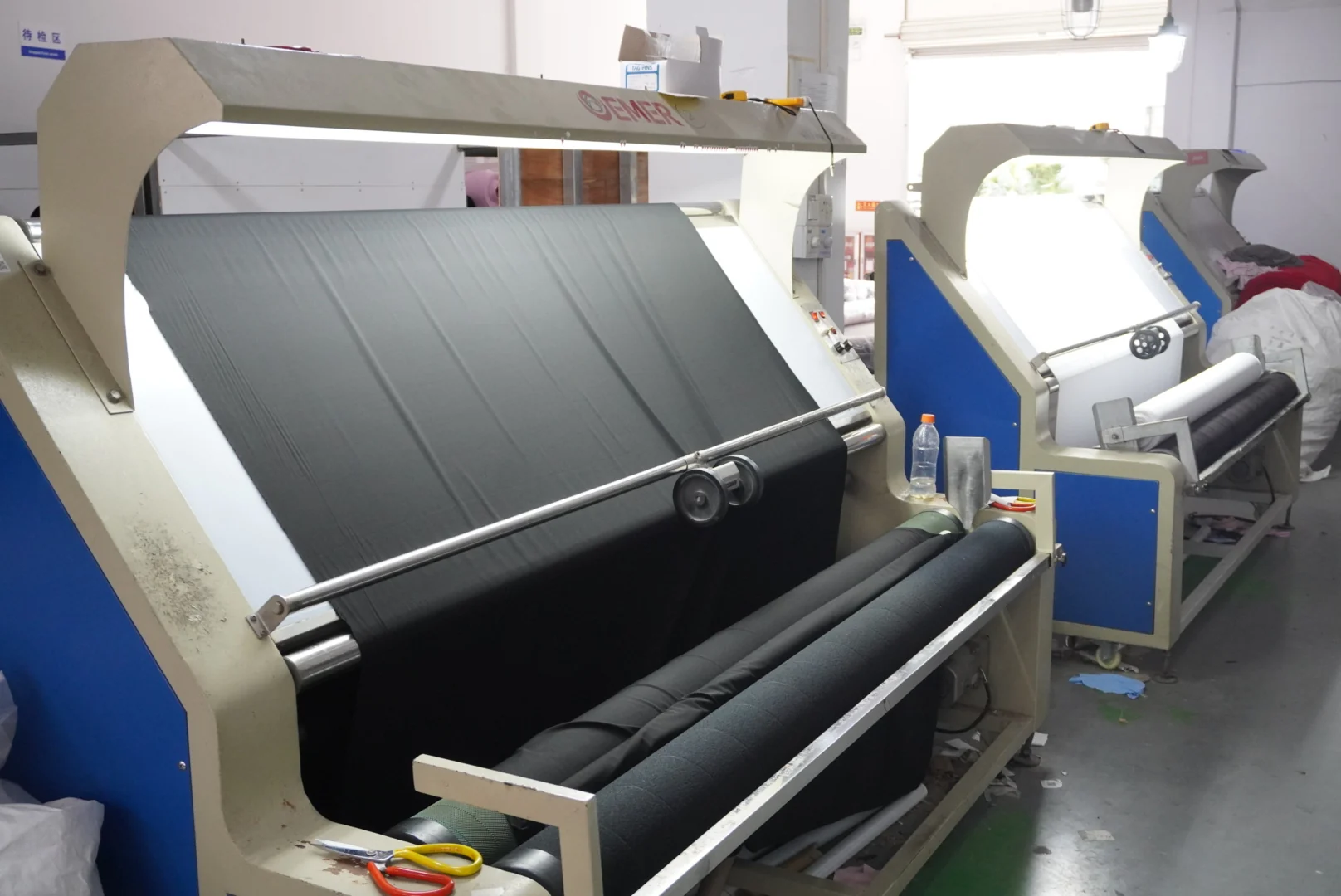 Incoming activewear fabric inspected on a fabric inspection machine