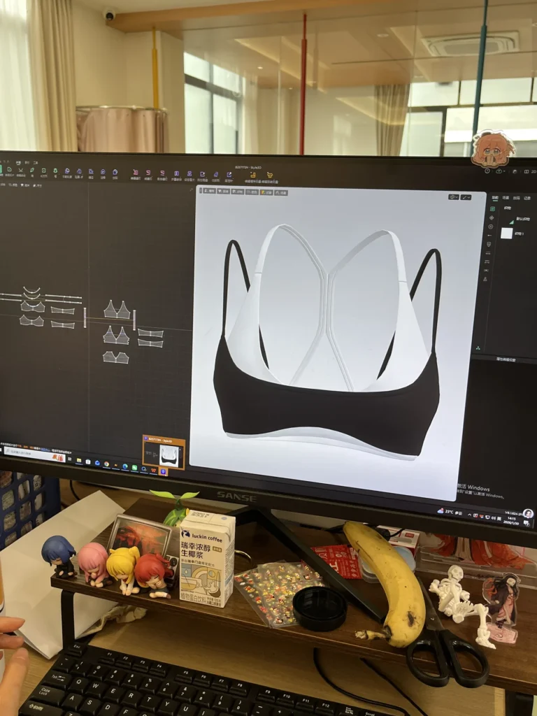MIQI activewear product definition reviewed on a digital design screen