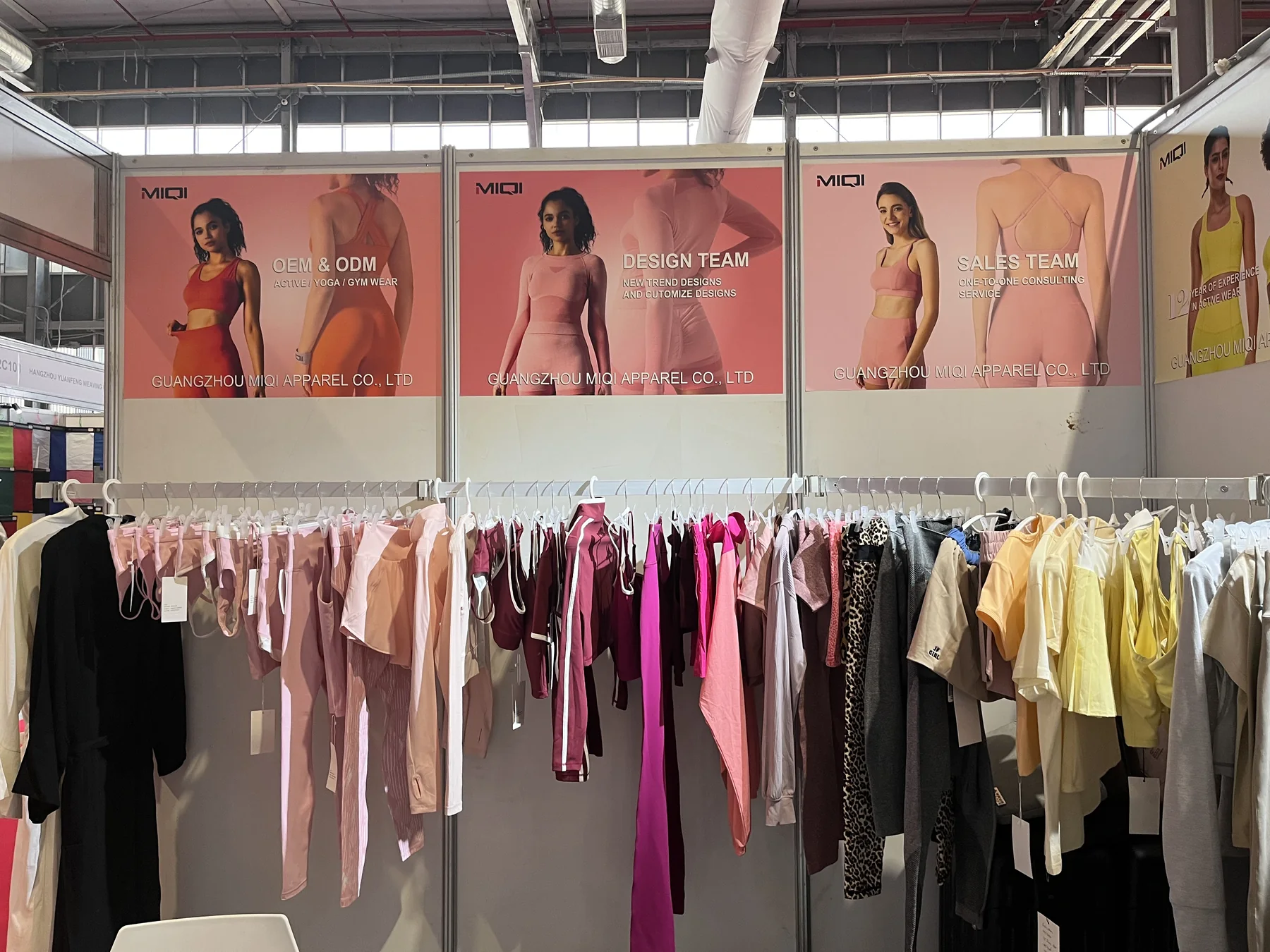 MIQI Apparel private-label activewear displayed at a Saudi Arabia trade show