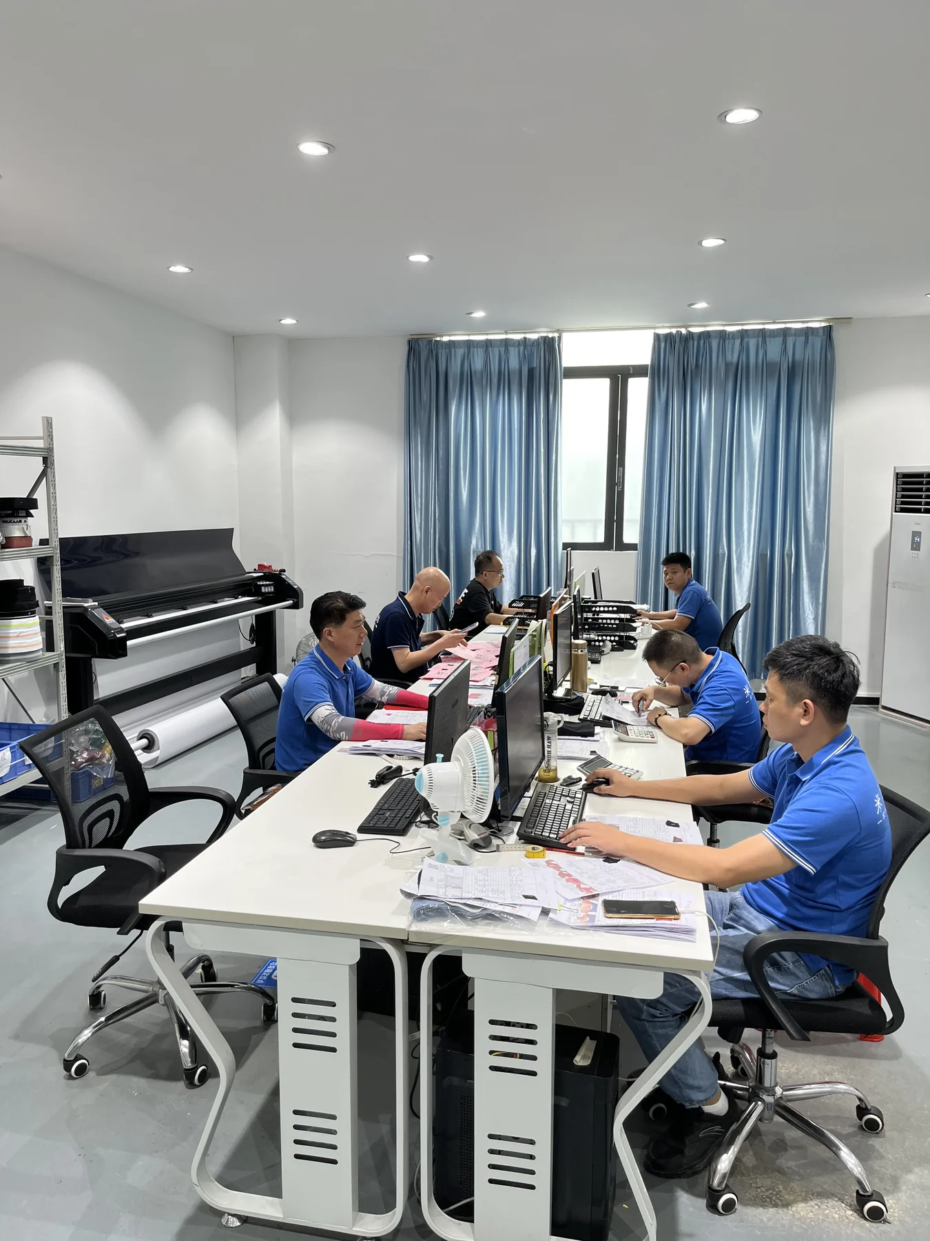 MIQI product and merchandising team preparing activewear project references