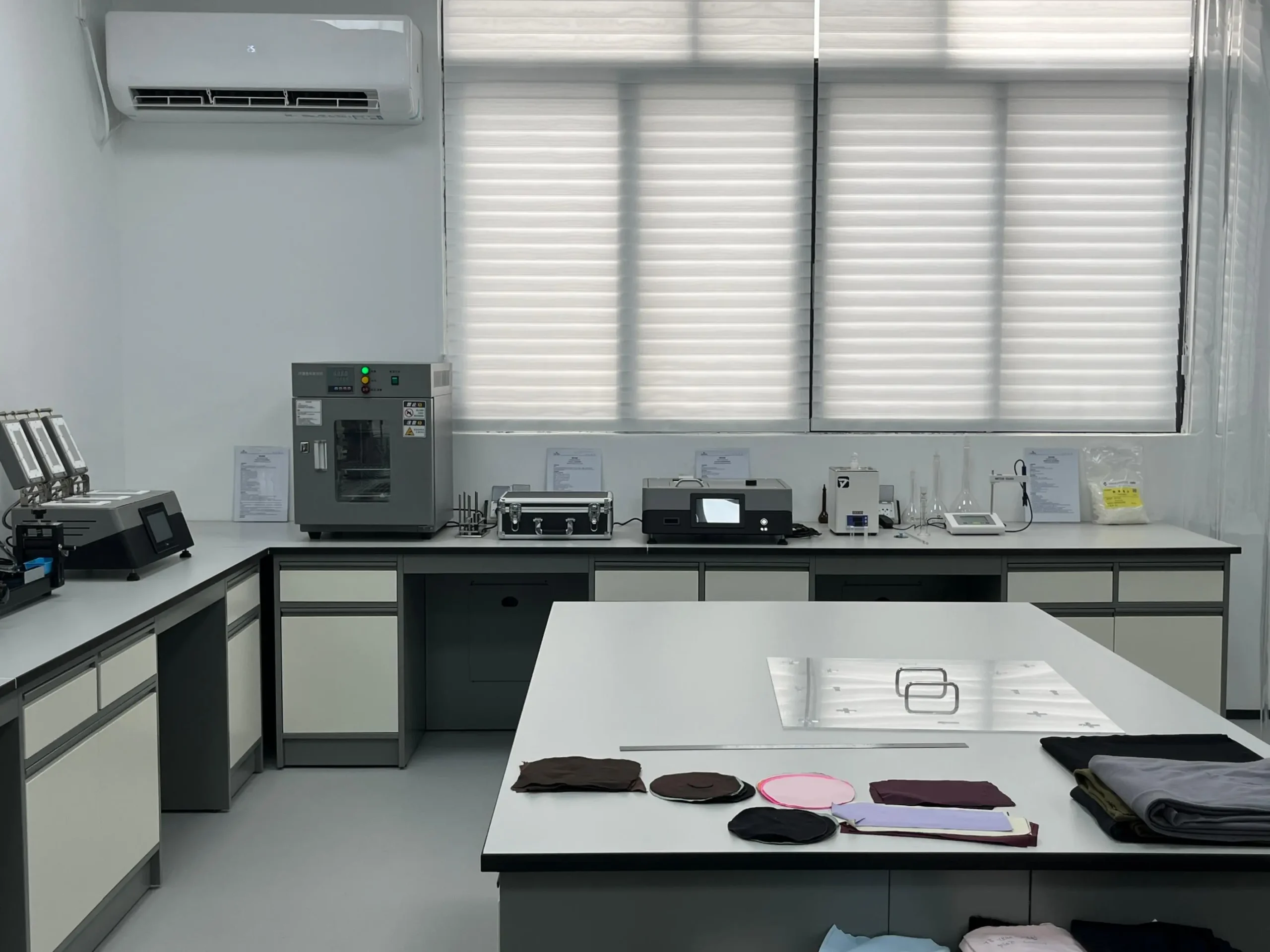 MIQI quality testing laboratory and activewear material samples
