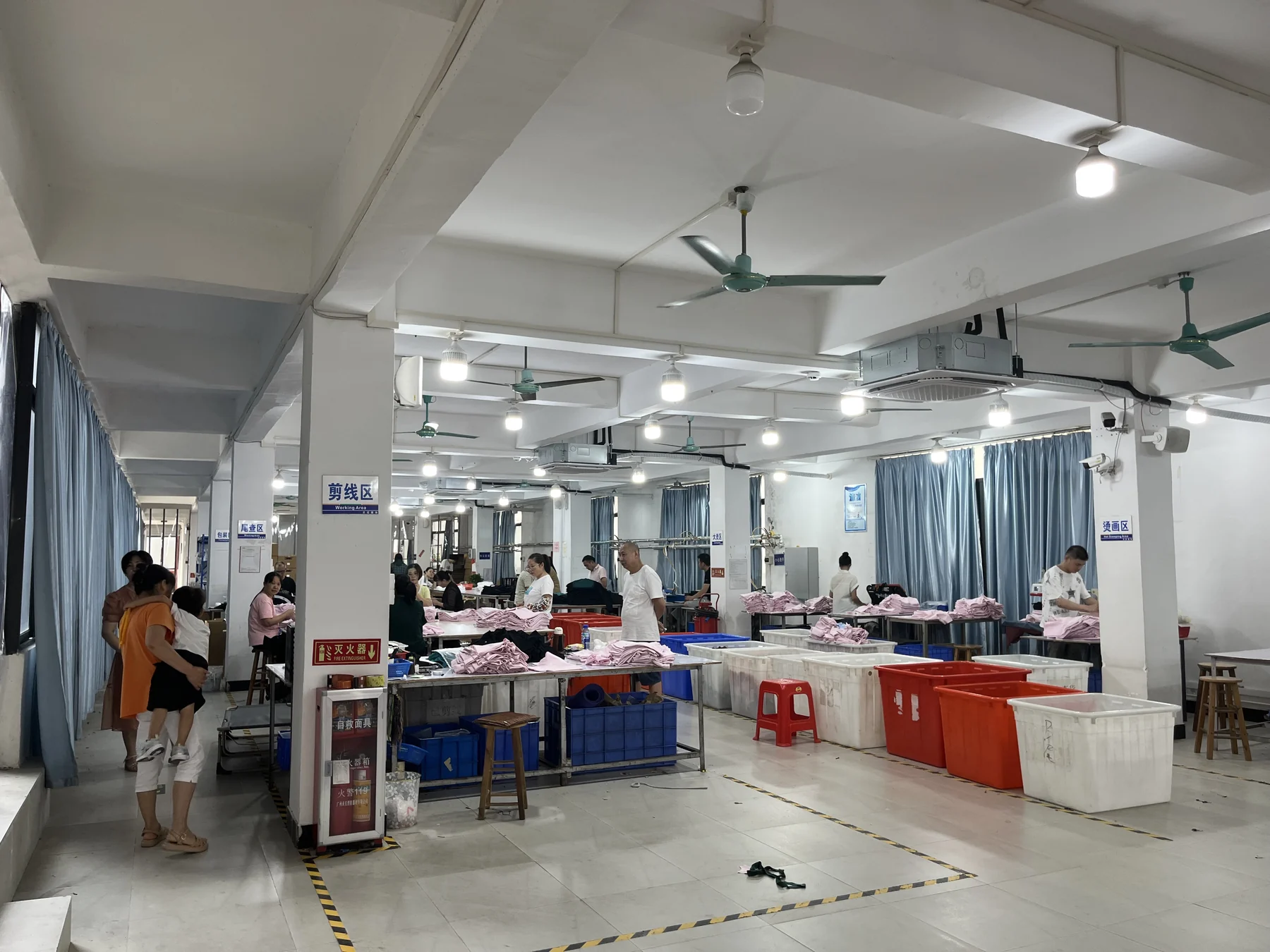 MIQI team performing in-line inspection during activewear production